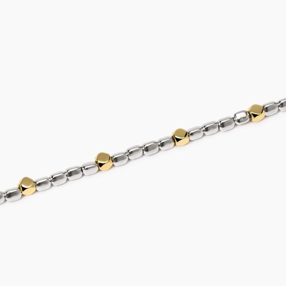 Bracciale regolabile con elementi placcati oro